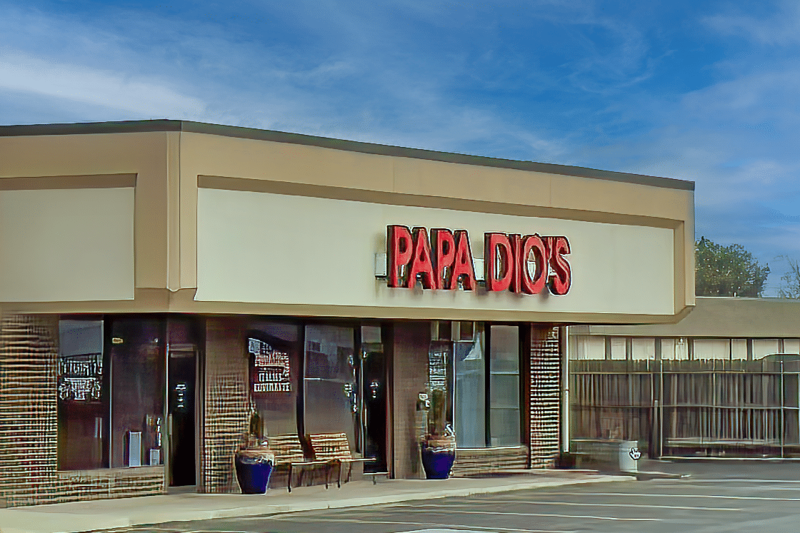 The front of Papa Dio's restaurant with its sign on it.