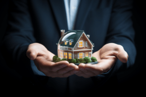 A businessman holding a model house during the mortgage underwriting process.