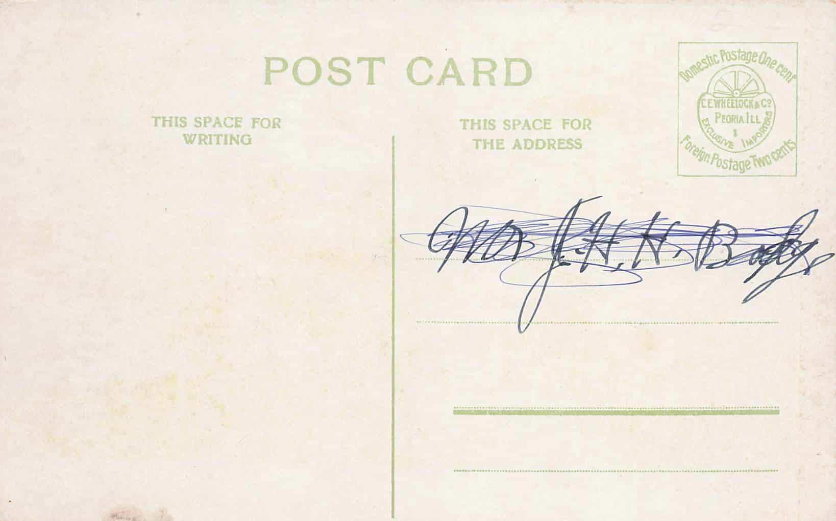 A post card from Guthrie City Hall with a signature on it.
