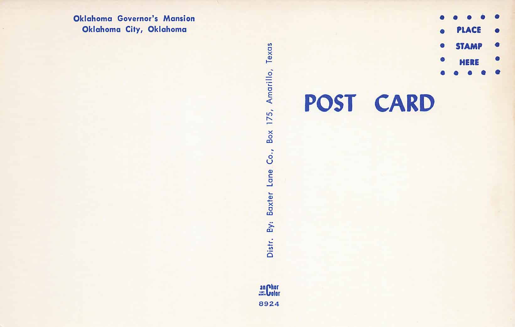 The back of a blue and white postcard.