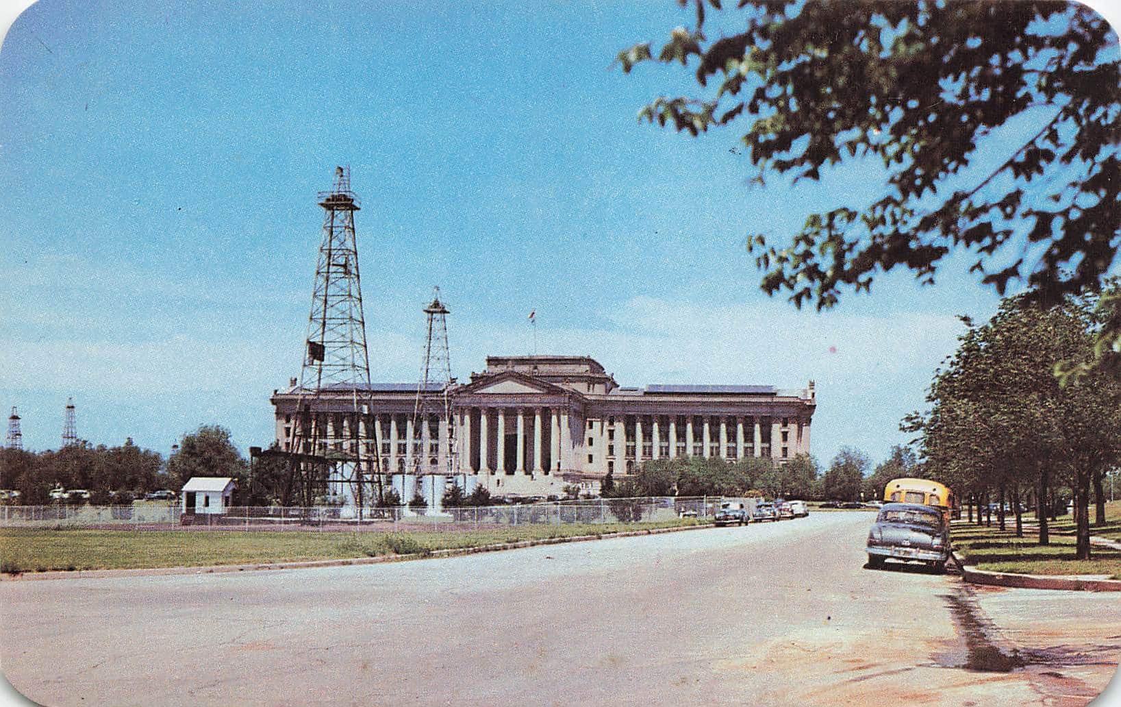 The Oklahoma State Capitol building showing the surrounding oil derricks.