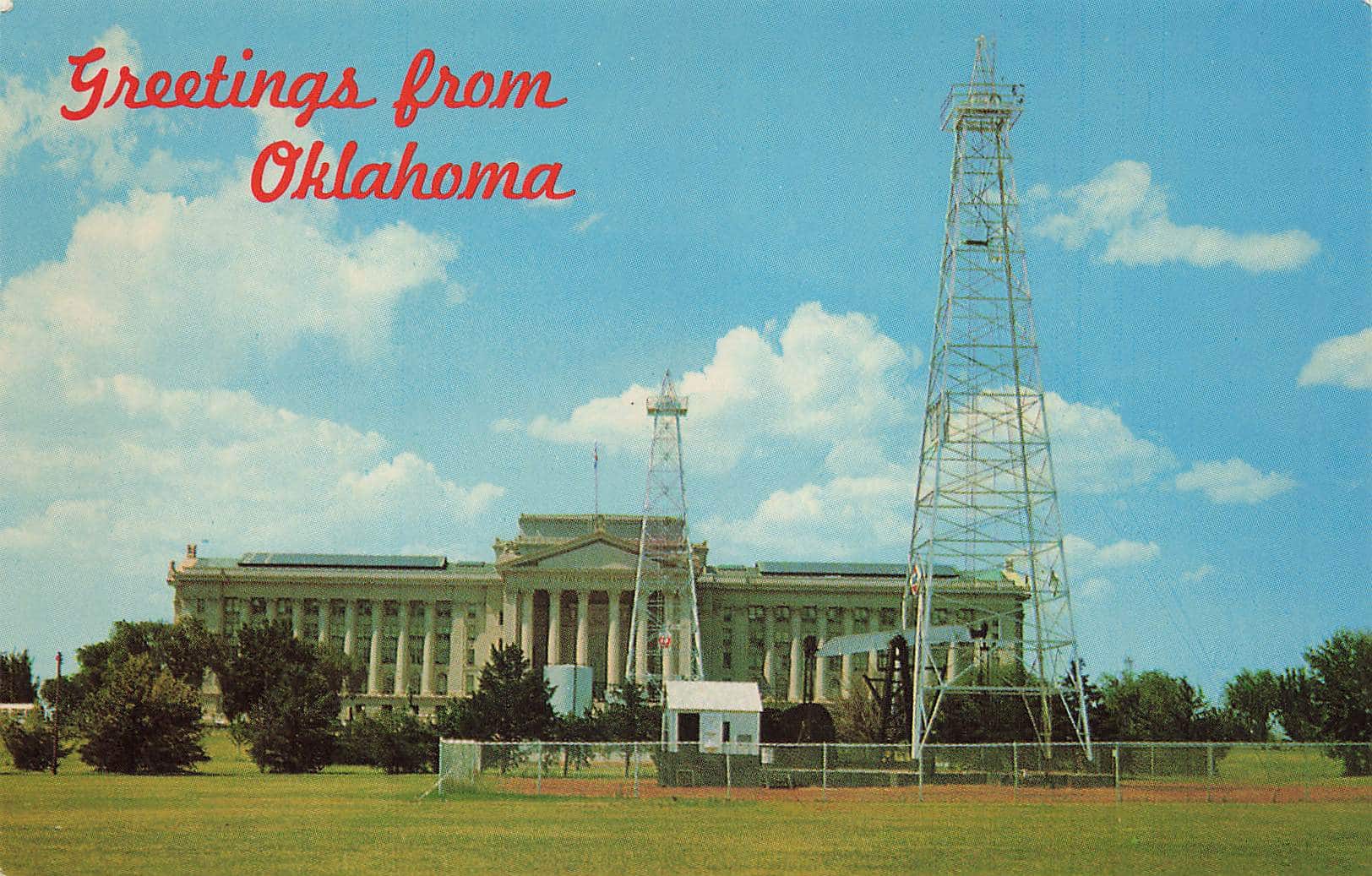 Another postcard showing the state capitol oil derricks.