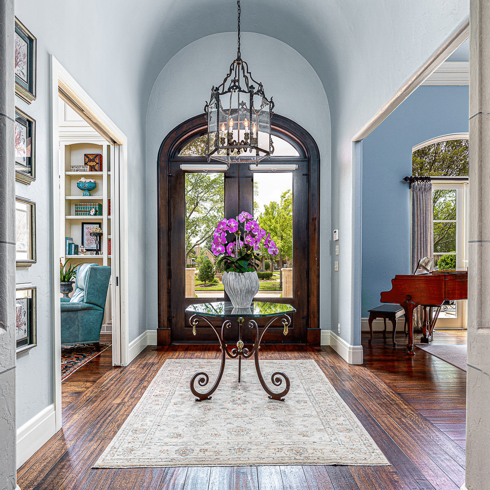 Bright entry and interior of an Oklahoma City home with large windows and modern finishes
