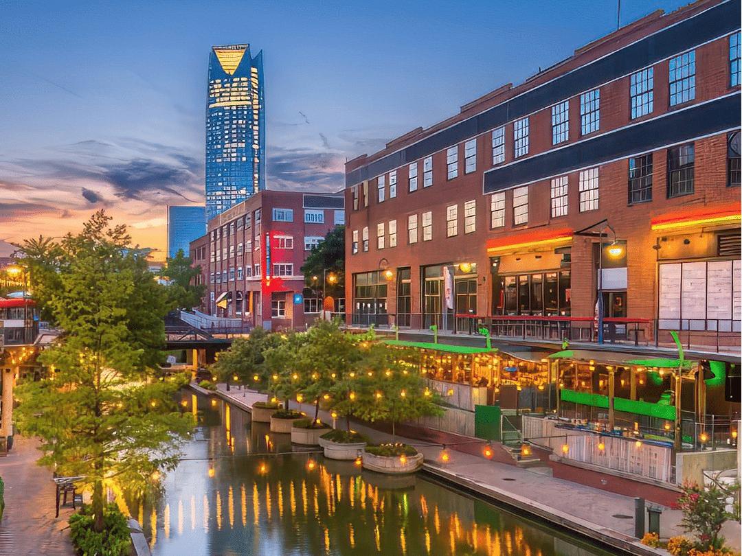 Bricktown Canal and downtown Oklahoma City at dusk